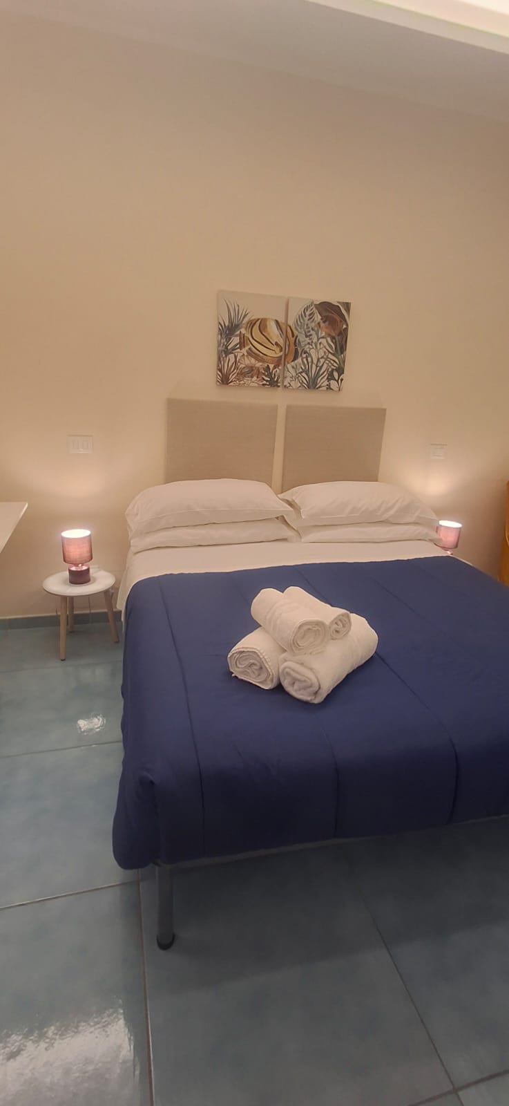 Camera Anemone - Letto con asciugamani e atmosfera calda
